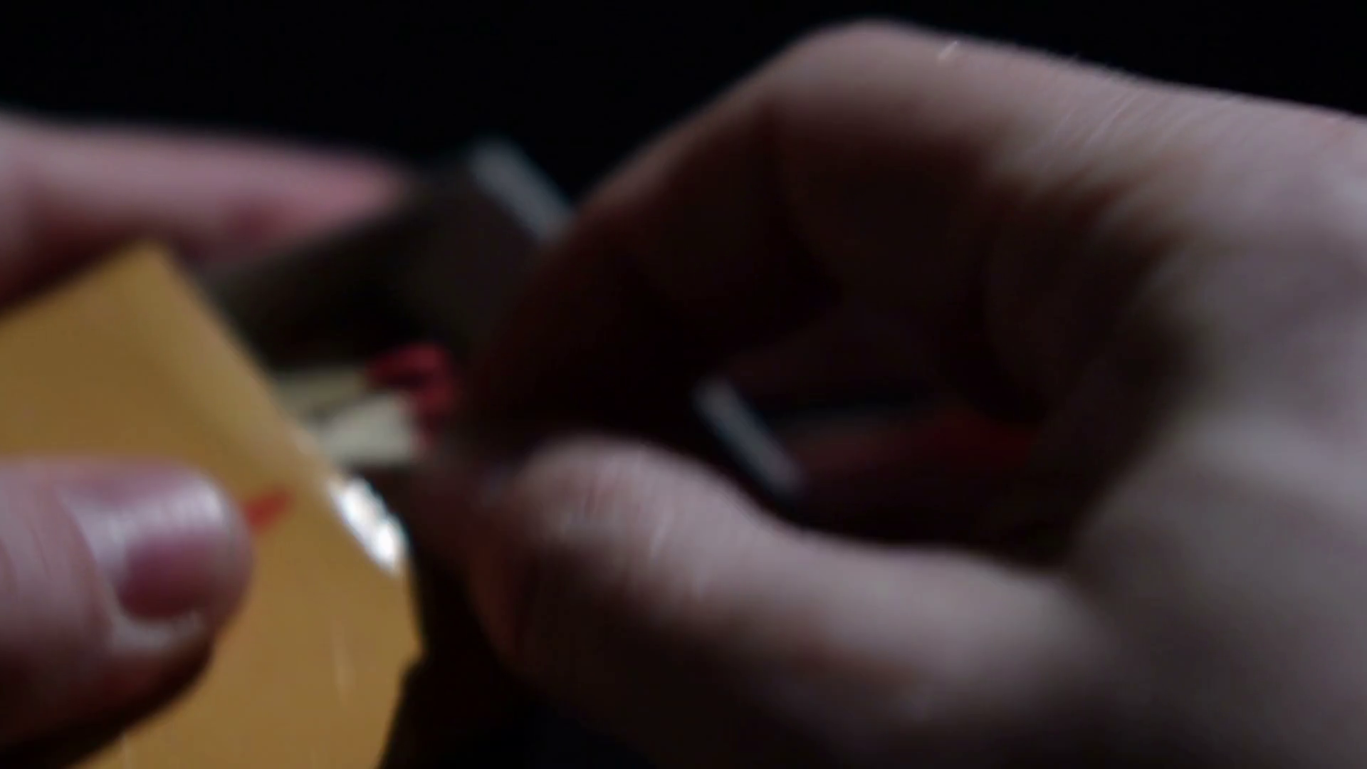 Opening matchbox. Close up of hands lighting a match. Stock Video
