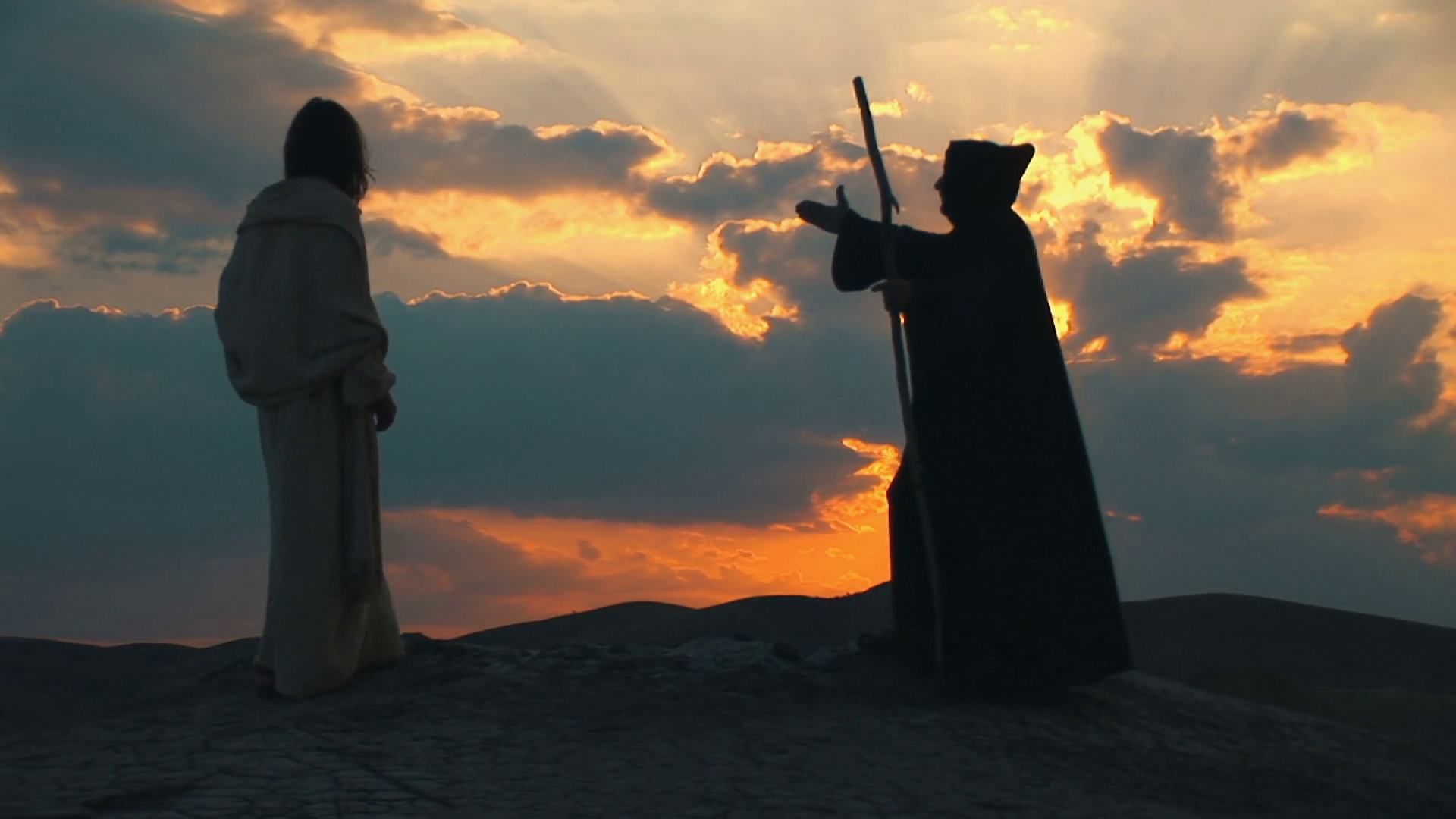 Christ and Devil on the Mountain at sunset Stock Video Footage