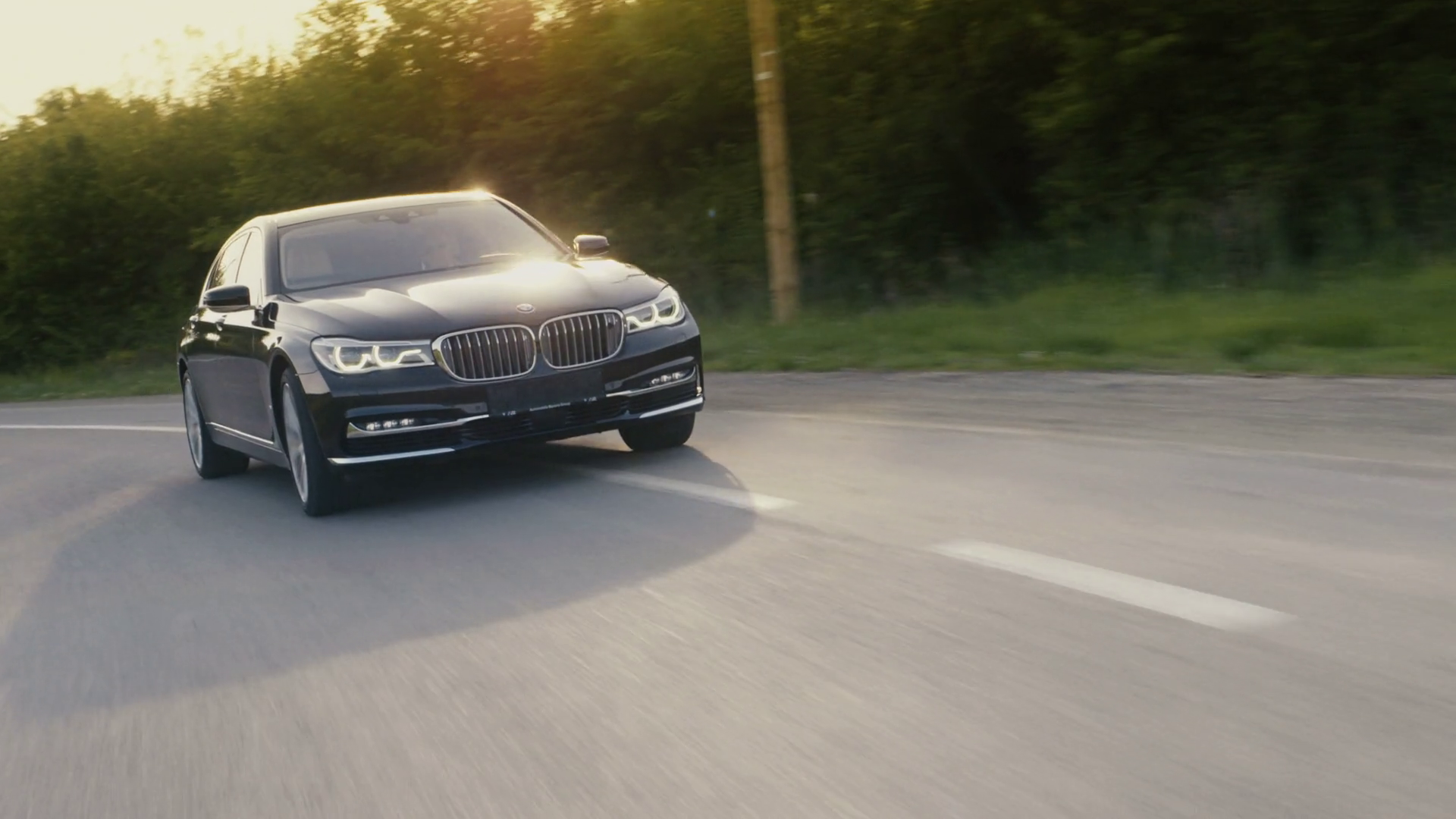 Luxury car driving in a beautiful landscape - MS Stock Video Footage