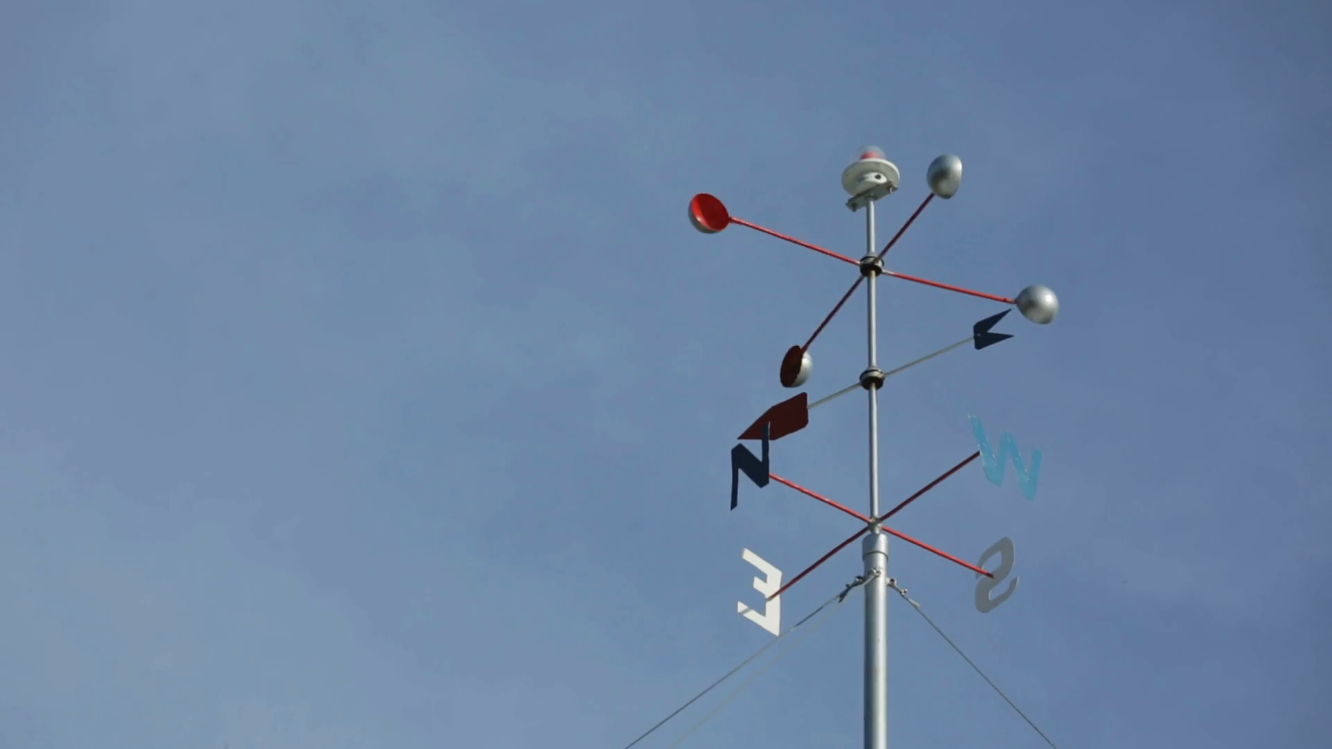 Weather Vane Rotates In Wind Against Cloudy Stock Footage SBV329731944