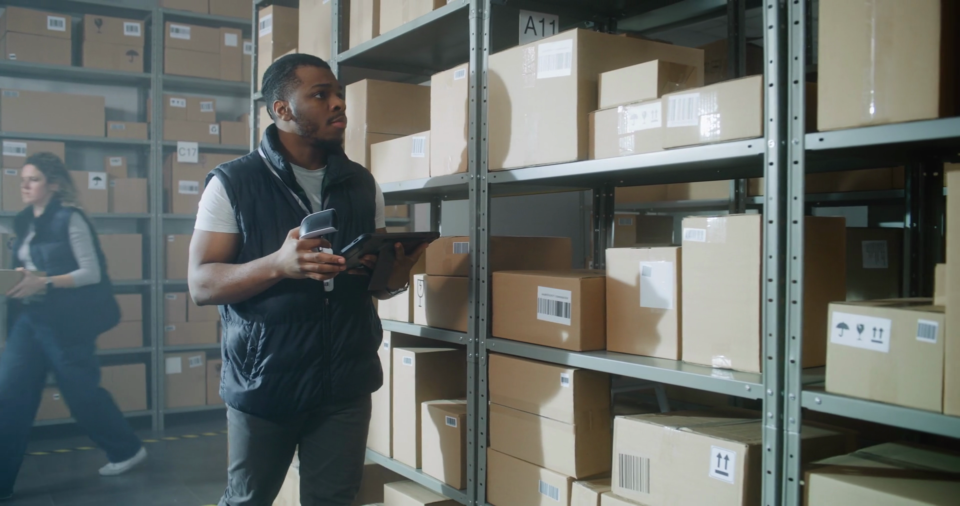 African American Inventory Specialist Walks Stock Footage SBV-351736127 ...