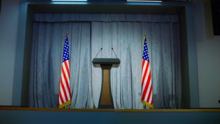 Speech tribune for minister, congressman or politician in the White House. Light press conference hall with seats. Wooden podium debate