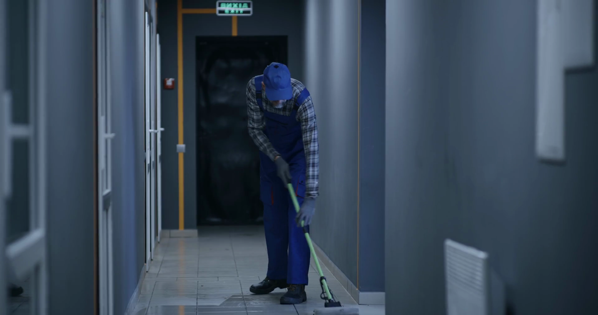 Full Shot Of Janitor Mopping Floor Of Stock Footage SBV338430479