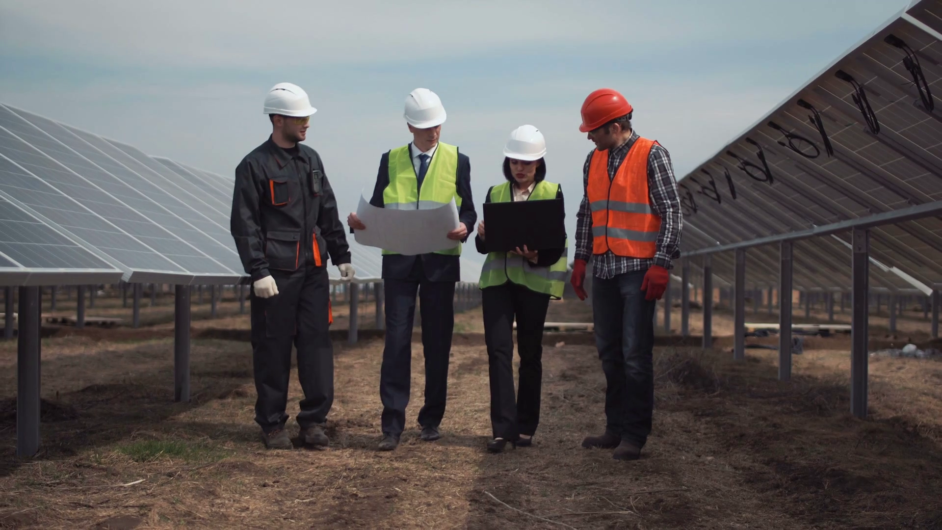 Group Of Engineers Technicians On Solar Farm Stock Footage SBV