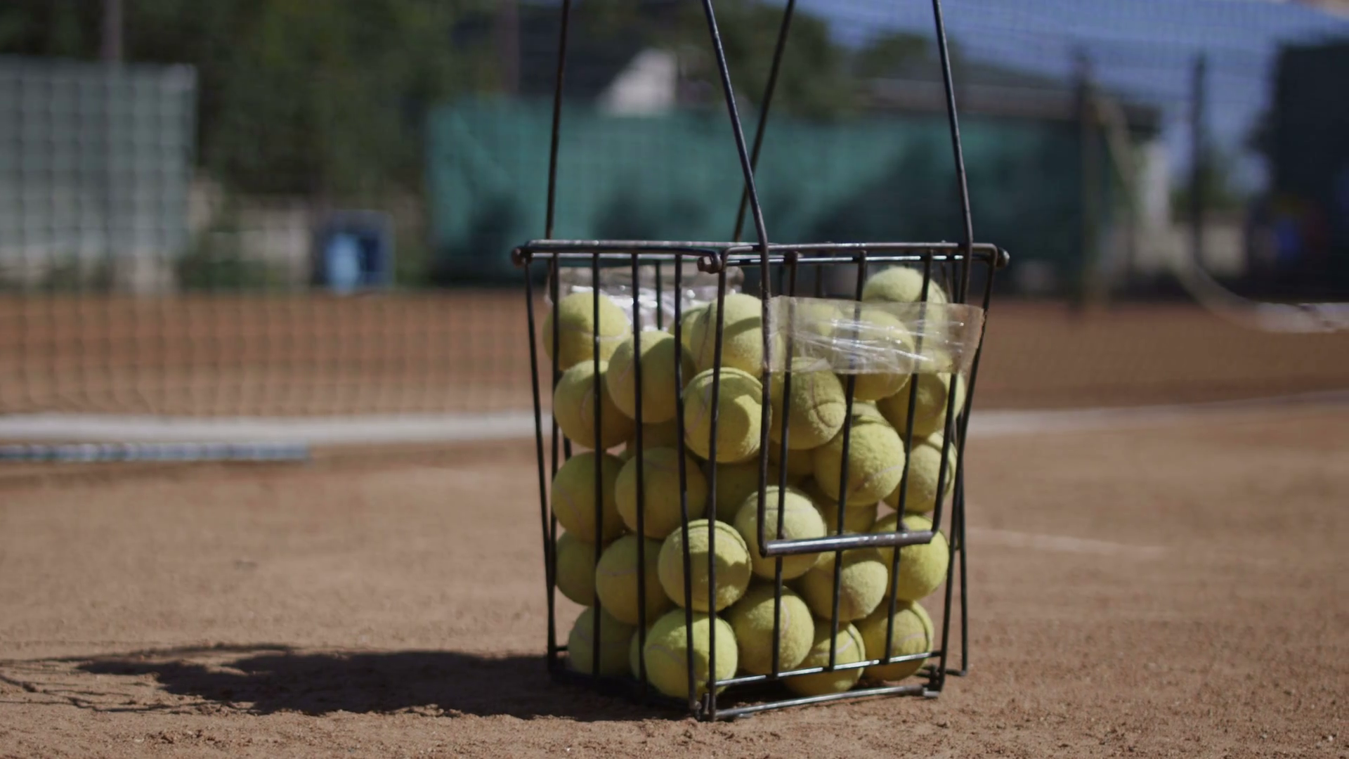 Metal Bucket With Yellow Fluffy Tennis Balls Stock Footage SBV