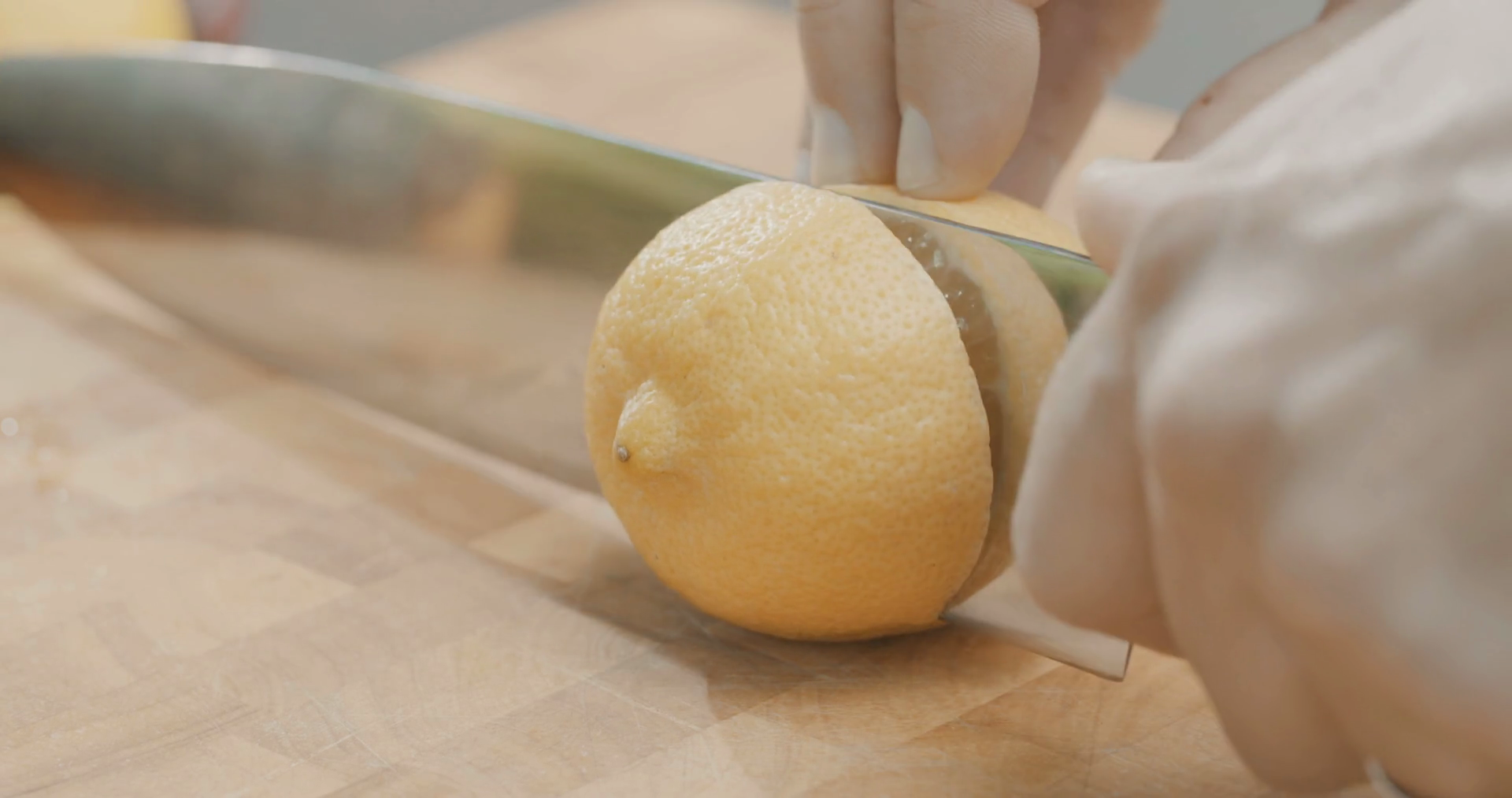 Knife cutting a lemon in slow motion Stock Video Footage Storyblocks