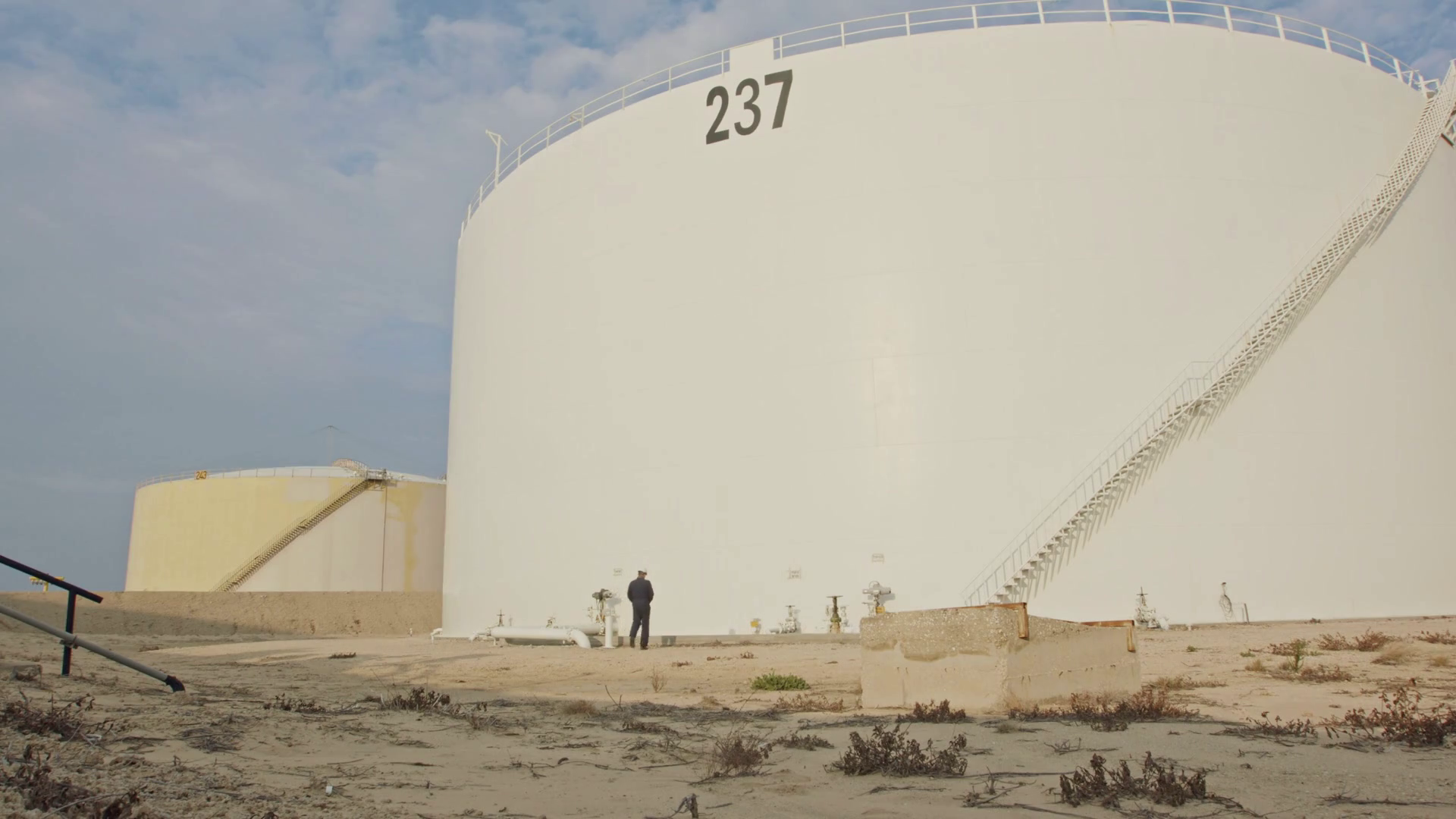 Large crude oil storage tanks in a huge refinery Stock Video Footage 0018 SBV329130329