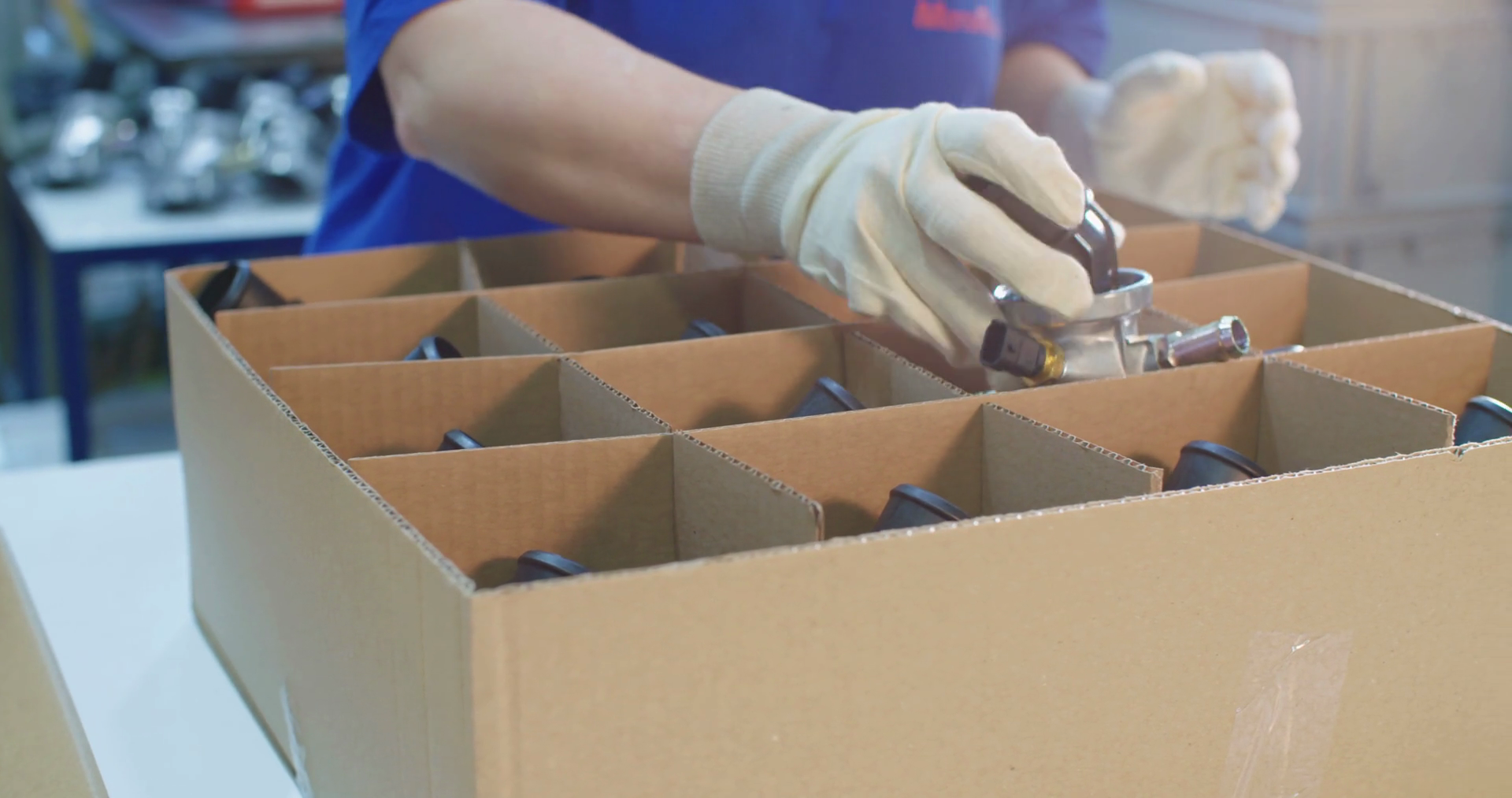Worker packing parts for delivery in a warehouse Stock Video Footage