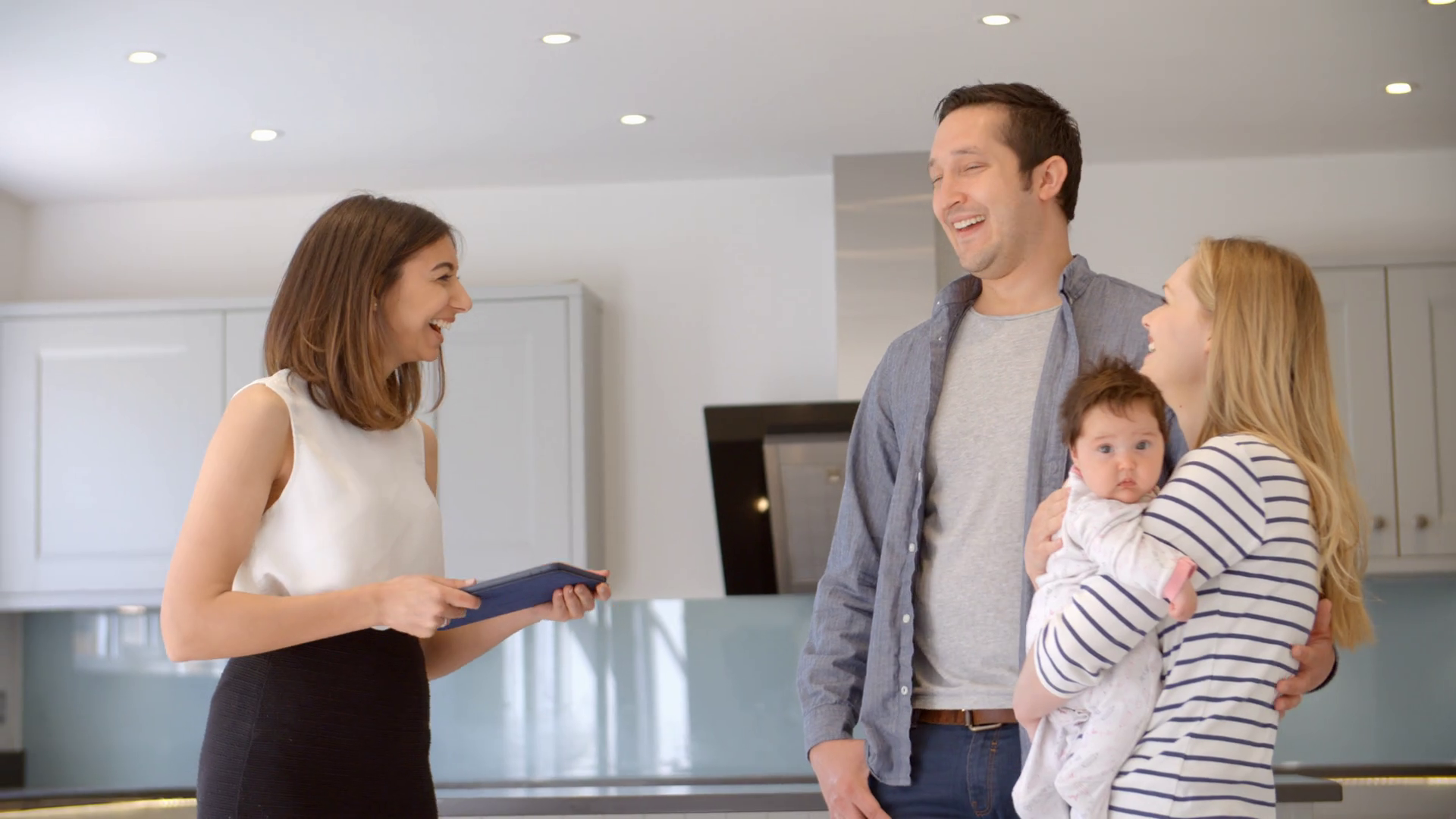 Realtor Guiding Family Through Property Sale Stock Footage SBV