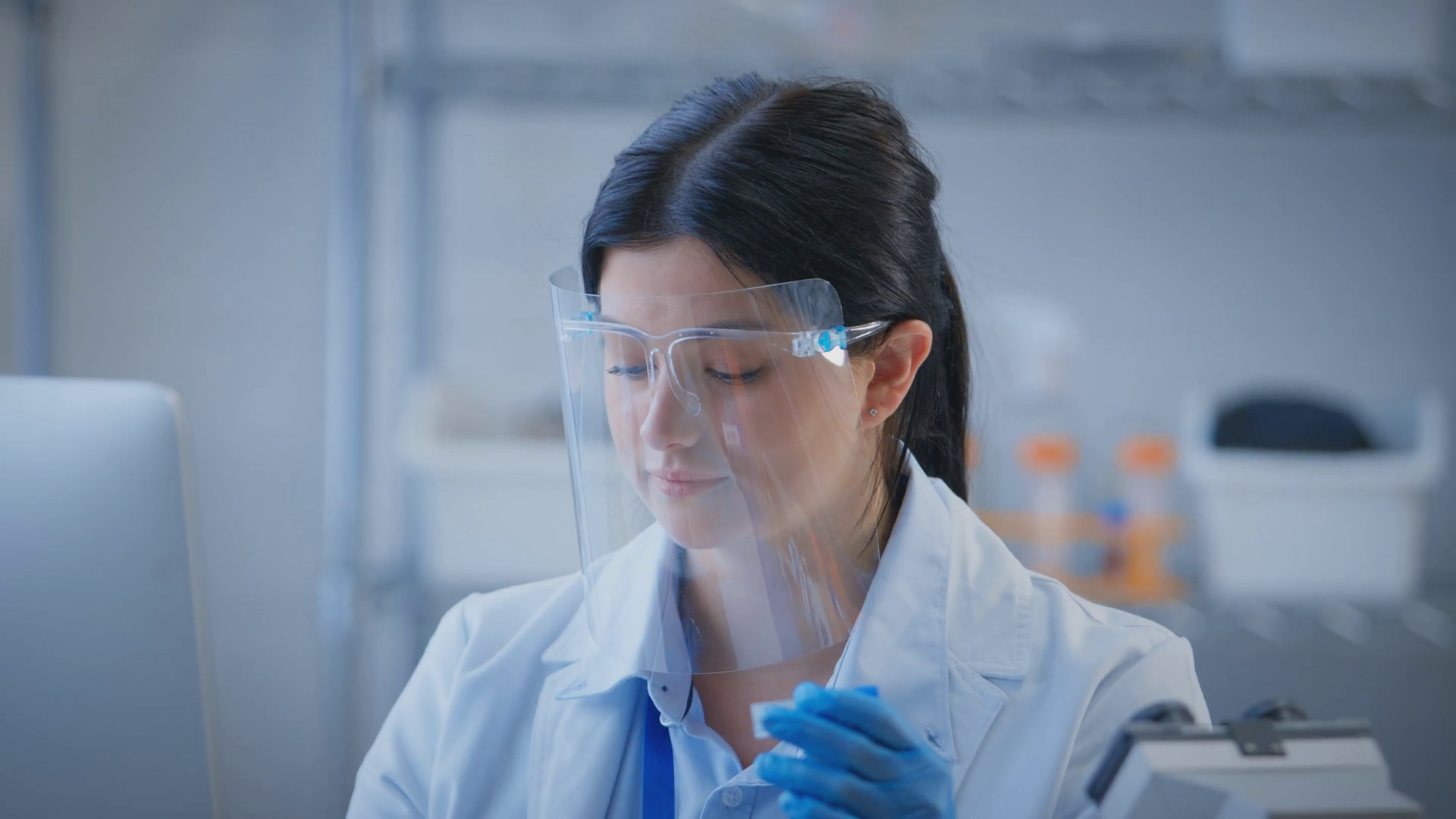 Female Lab Worker Wearing Ppe Face Shield Stock Footage SBV346797660
