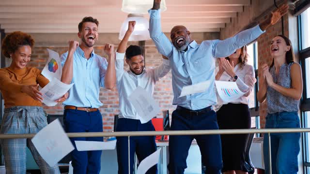 Employees Cheering Stock Footage: Royalty-Free Video Clips - Storyblocks