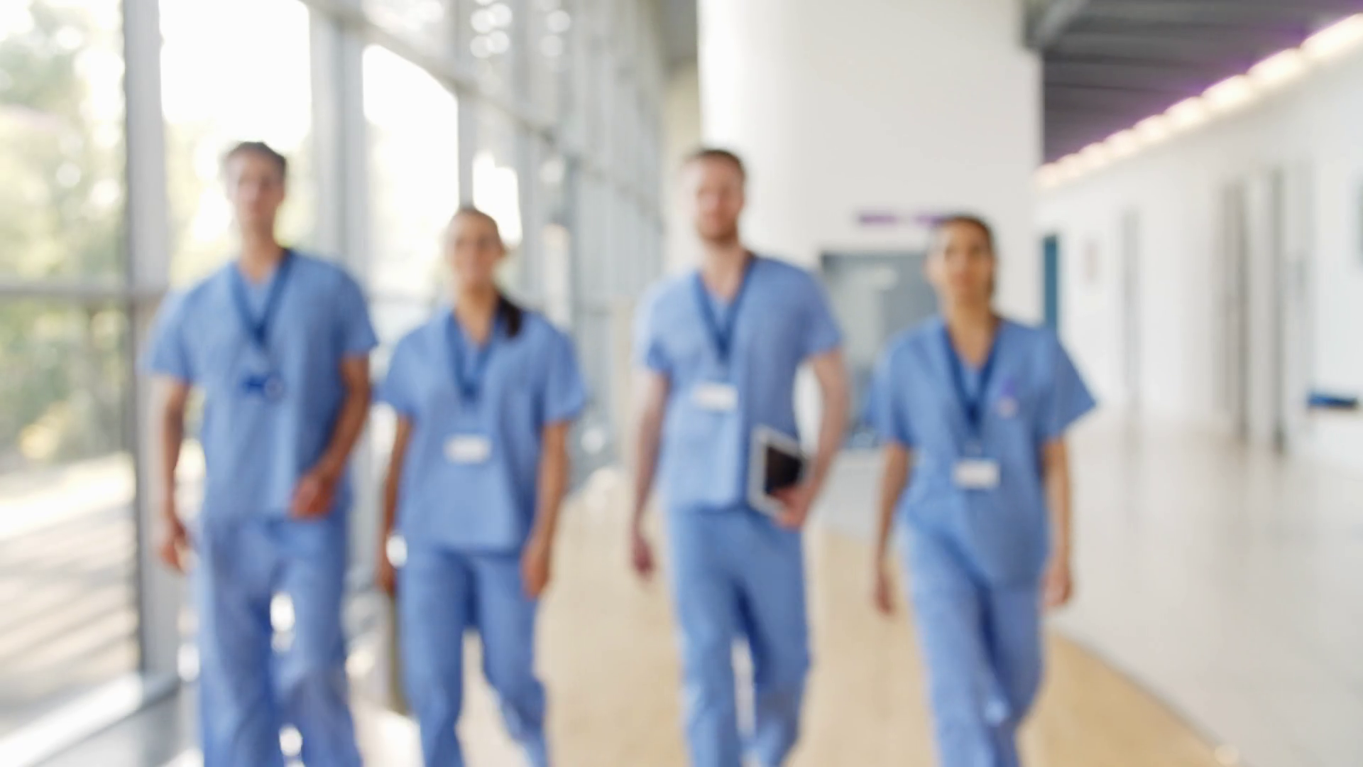 Medical Interns Wearing Scrubs Walk Towards Stock Footage SBV323485513