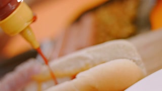 Preparing Delicious Chili Cheese Hot Dogs. Taste Classic American Cuisine.