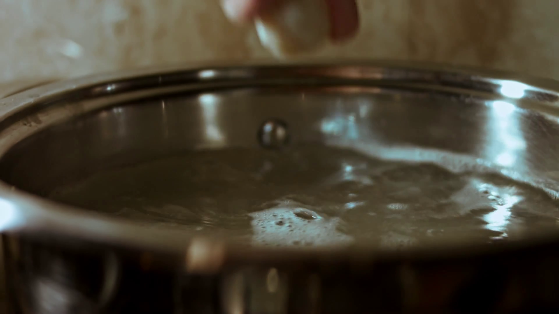 Gnocchi being cooked in salt water. 4k Video Stock Video Footage 0014