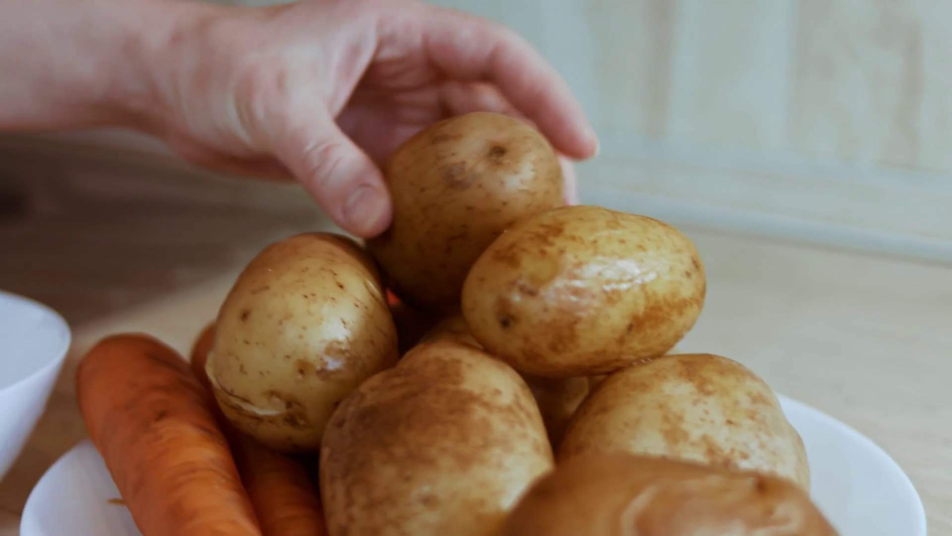 Woman Peeling Boiled Potatoes With Knife Stock Footage SBV347229552