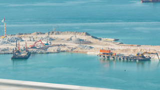 Aerial view of Palm Jumeirah Island timelapse.