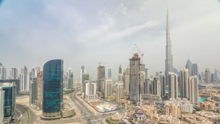 Downtown Dubai skyline with recidential towers timelapse, view from rooftop.