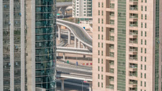 Residential and office buildings in Jumeirah lake towers district timelapse in Dubai