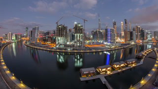 Dubai skyline at sunrise aerial timelapse