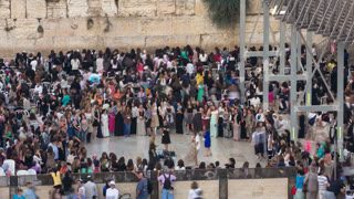 Religious Jews sunset prayer service at the Western Wall, Israel timelapse