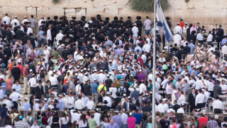 Religious Jews sunset prayer service at the Western Wall, Israel timelapse