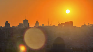 Jerusalem view over the City at sunset timelapse with the Dome of the Rock from the Mount of Olives.