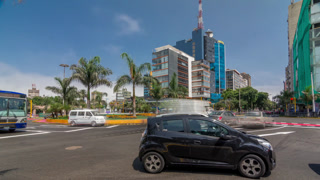 Major road intersection on Plaza Grau square with traffic timelapse hyperlapse in Lima.