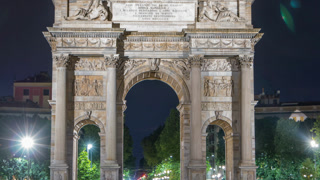 Arch of Peace in Simplon Square timelapse at night. It is a neoclassical triumph arch