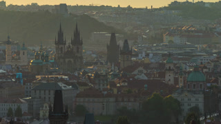 Spires of the old town and tyn church at sunrise timelapse. czech republic, prague