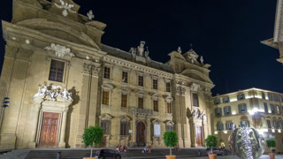 Catholic Church called Complesso di San Firenze timelapse hyperlapse in the square Piazza di S. Firenze at night. Florence, Tuscany, Italy.