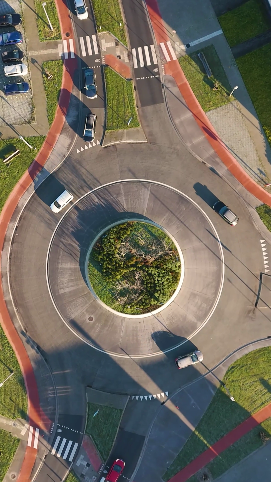 Cars Driving Around Roundabout Vibrant Red Stock Footage SBV-353269881 ...