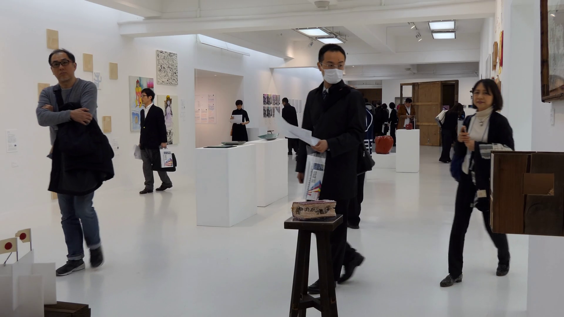People visit an exhibition in an art gallery in Tokyo, Japan, Asia
