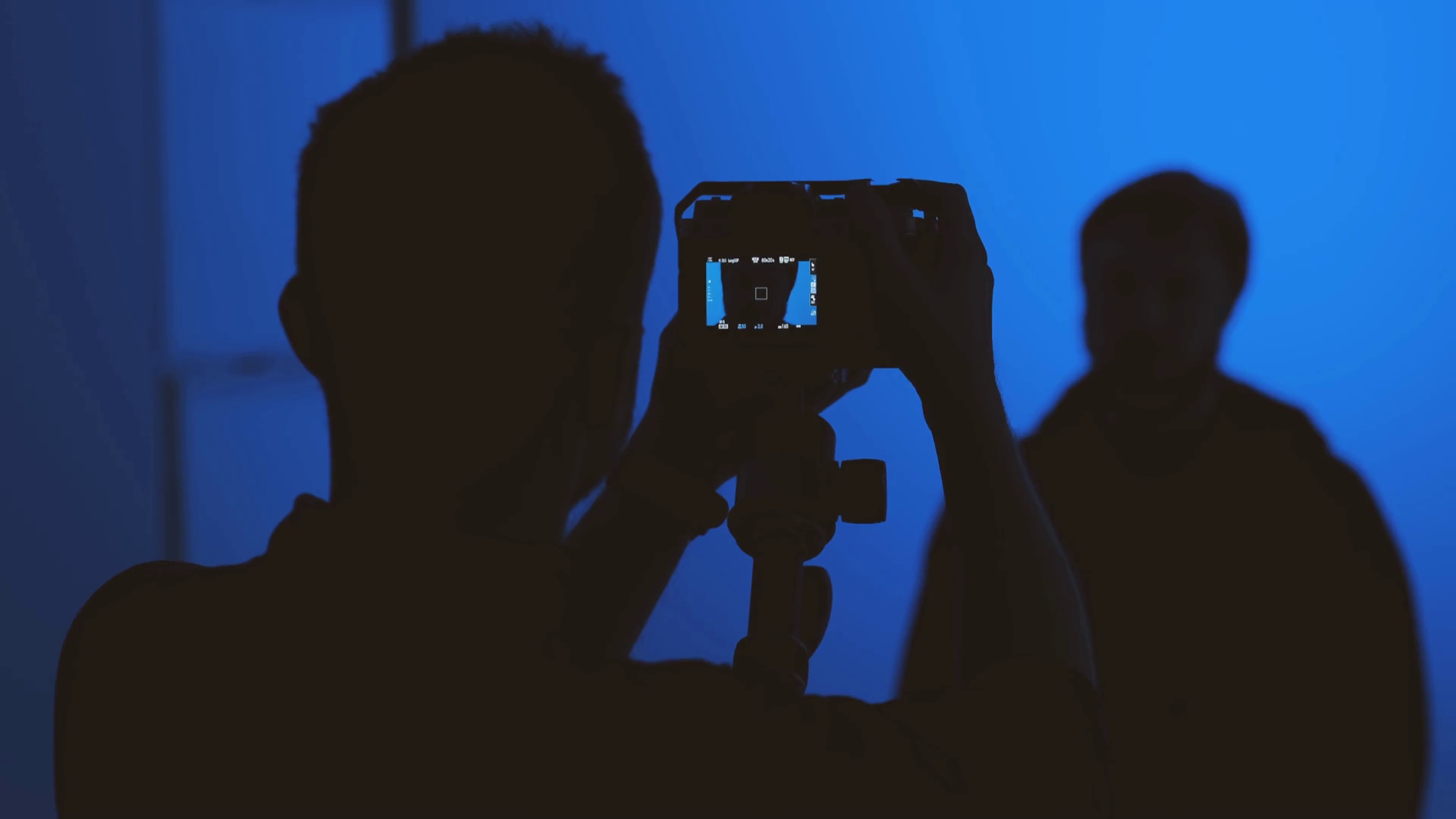 The Man Installs Camcorder Shooting Video Stock Footage SBV346459636