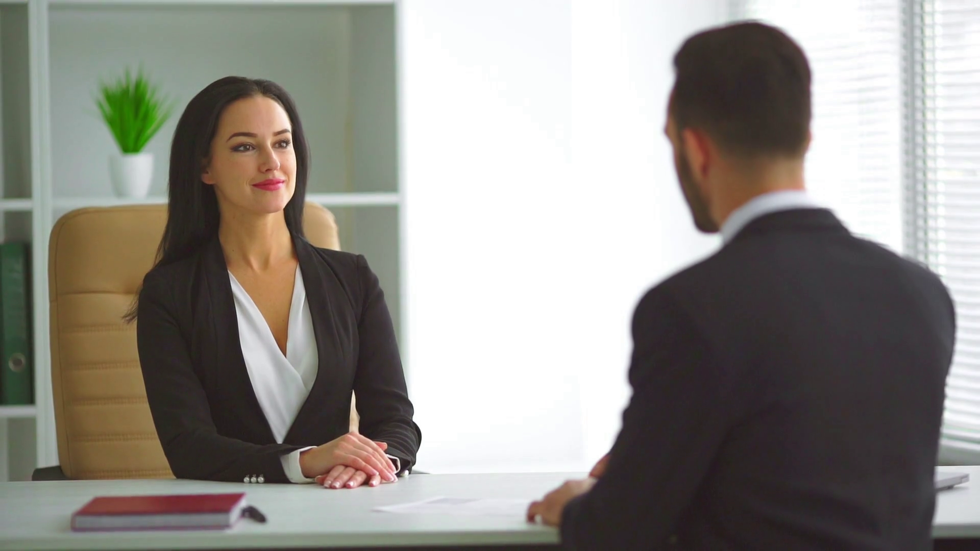 https://dm0qx8t0i9gc9.cloudfront.net/thumbnails/video/r9E0QYuleiv25jmq9/videoblocks-the-business-woman-and-a-man-talking-in-the-office-slow-motion_hwp-rdfdr_thumbnail-1080_01.png