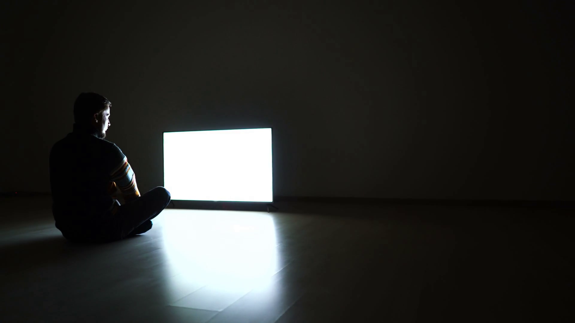 The Man In Dark Room Sitting On Floor Near Stock Footage SBV329050837 Storyblocks