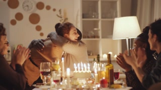 Celebratory birthday moments with diverse friends at home