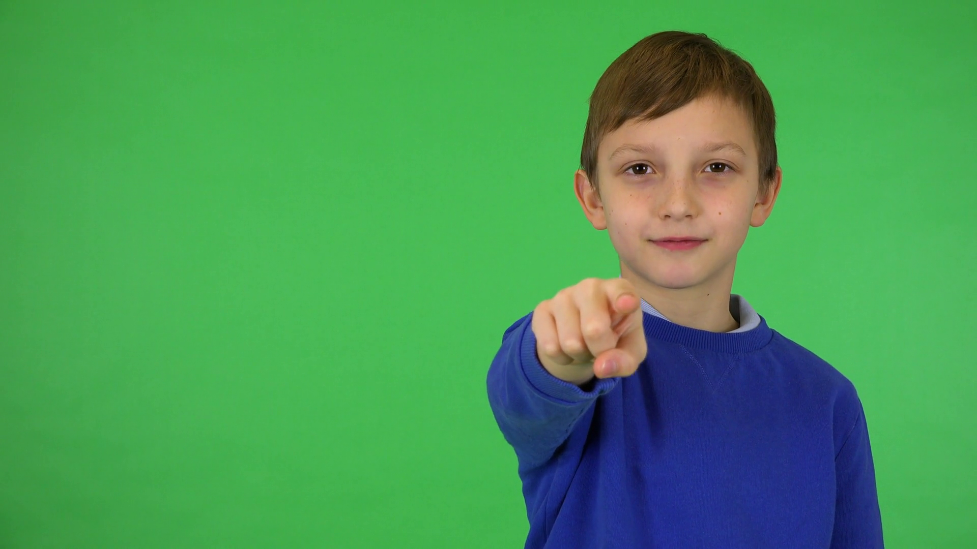 A Young Child Gestures At Camera With Smile Stock Footage SBV337164583