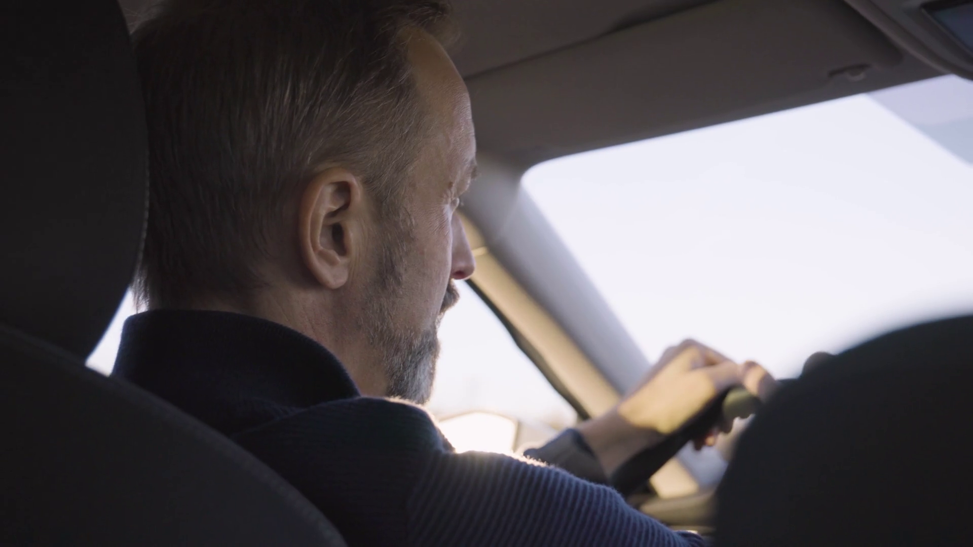 A Middle-aged Caucasian Man Drives Car On Stock Footage SBV-347017382 ...