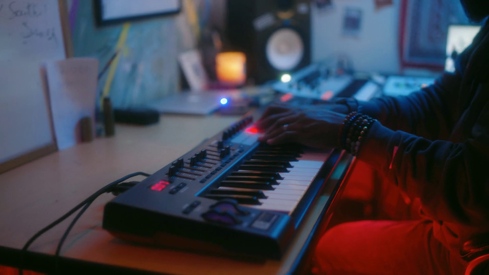 Handheld shot of African American keyboardist playing music Stock Video