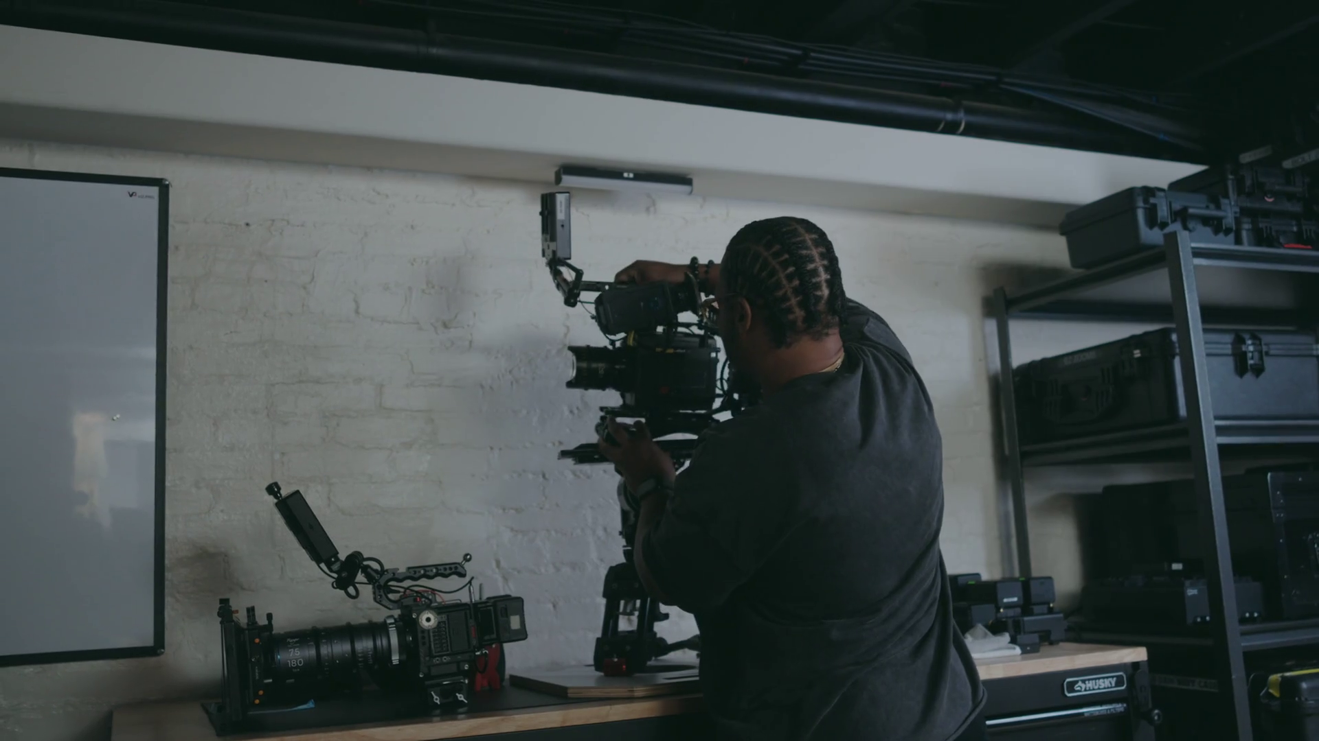 Handheld Shot Of Cameraman Setting Up Camera Stock Footage SBV ...