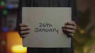 26th January Written On Banner Man Holding Placard
