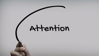 Attention Hand Writing Text On Glass Screen
