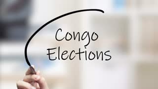 Congo Elections Handwriting Using Black Marker On Glass
