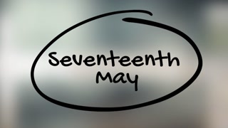 Seventeenth May Handwriting With Black Marker On Glass Surface