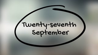 Twenty Seventh September Handwriting With Black Marker On Glass Surface