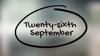 Twenty Sixth September Handwriting With Black Marker On Glass Surface