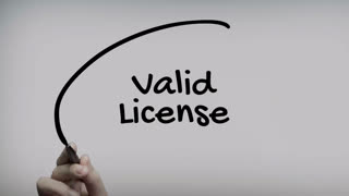 Valid License Hand Writing Text On Glass Screen