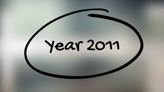 Year 2011 Handwriting With Black Marker On Glass Surface