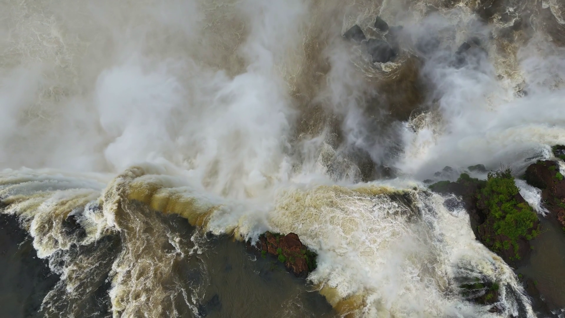 Water Cascades Heavily Into Deep Chasm Stock Footage SBV-352327247 ...