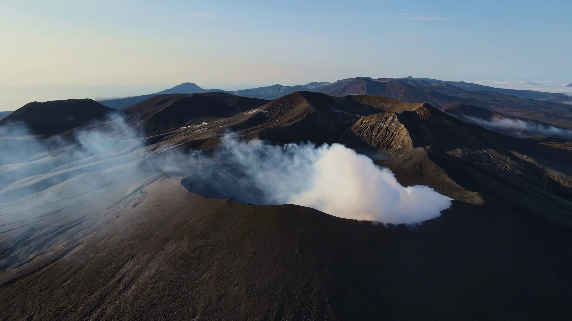 Aerial View Of Eruption Of Ash Clouds Ebeko Stock Footage SBV-347651104 ...